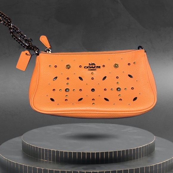 Coach Handbags - EUC Coach Authentic Small Nolita Wristlet 19
With Prairie Rivets